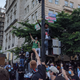 Protest organizers scale a stoplight outside LaFayette Square in DC on June 2.